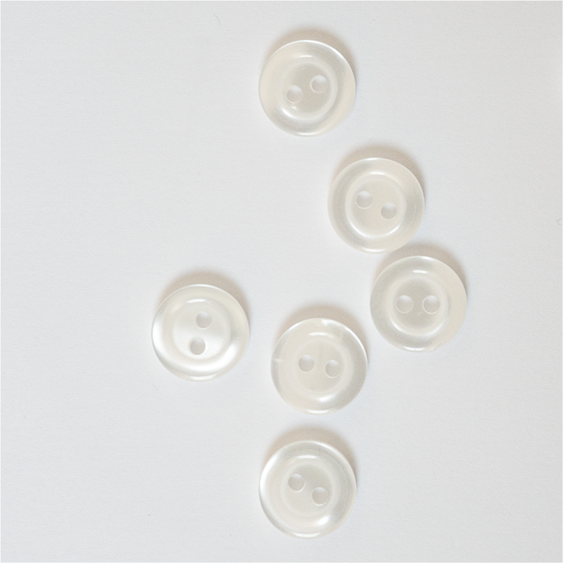 Bouton synthétique blanc 11mm